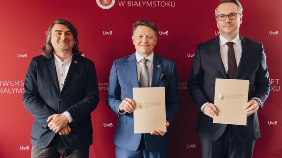 prof. Adam Bartnicki, prof. Mariusz Popławski i Paweł Prus
